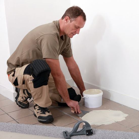 Carpet Laying (Adhesive Method)